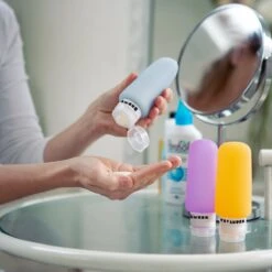 TRVLMORE Silicone Reisflesjes - Navulbaar - Handbagage - 100 ML - 3 Stuks - Oranje/Paars/Blauw -Verzorgingsproducten Verkoop 1200x1200 724