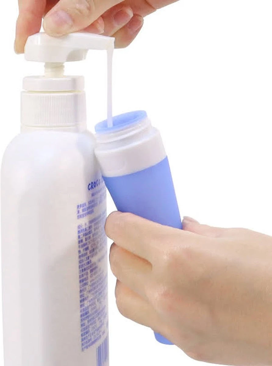 Merkloos Reisverpakking – Navulbare Silicone Reisflesjes Incl. Reispotjes En Doorzichtige Toilettas – Reisset Met Reisflacons & Cosmetica Potjes - Vliegtuig Handbagage Set –– 7 Stuks In Etui –80ML En 20ML - Reisaccessoires 4 Merkloos Reisverpakking – Navulbare Silicone Reisflesjes Incl. Reispotjes En Doorzichtige Toilettas – Reisset Met Reisflacons & Cosmetica Potjes - Vliegtuig Handbagage Set –– 7 Stuks In Etui –80ML En 20ML - Reisaccessoires - Afbeelding 2