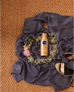 NIVEA Q10 Firming + Bronze Body Lotion - 400 Ml 14 NIVEA Q10 Firming + Bronze Body Lotion - 400 Ml -Verzorgingsproducten Verkoop 964x1200 1