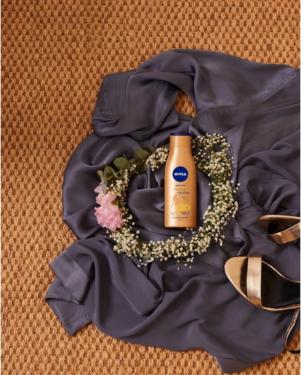 NIVEA Q10 Firming + Bronze Body Lotion - 400 Ml 7 NIVEA Q10 Firming + Bronze Body Lotion - 400 Ml - Afbeelding 5