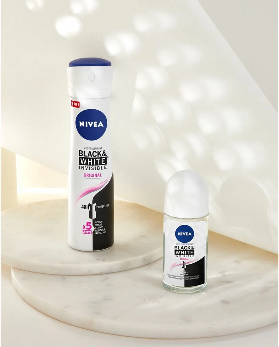 NIVEA Invisible For Black & White Clear - 6 X 150 Ml - Voordeelverpakking - Deodorant Spray 8 NIVEA Invisible For Black & White Clear - 6 X 150 Ml - Voordeelverpakking - Deodorant Spray - Afbeelding 6